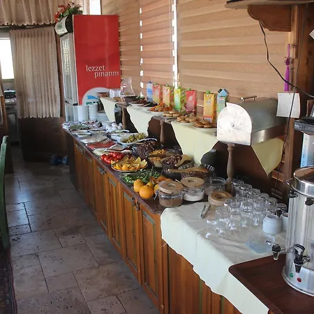 Cave Rooms&pool Гьореме