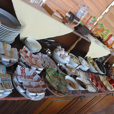 Cave Rooms&pool Гьореме